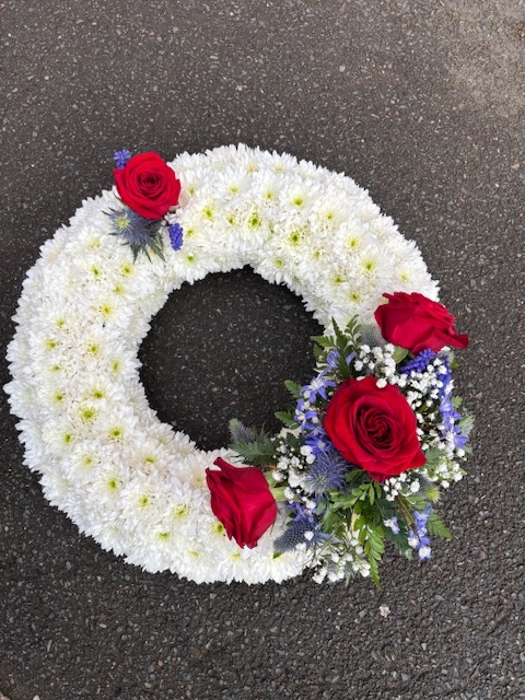 White massed wreath with spray