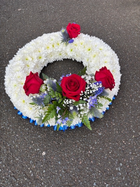 White massed wreath with spray