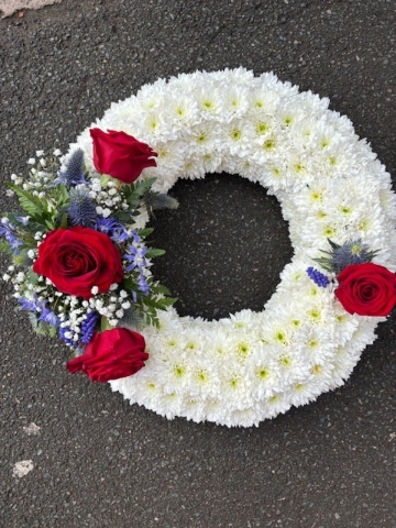 White massed wreath with spray
